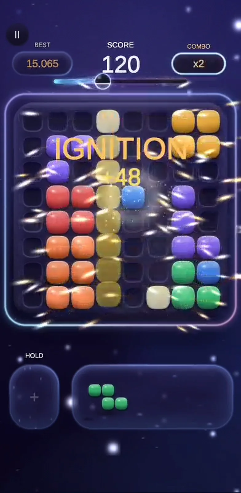 A row clearing in gold with the IGNITION combo callout on screen.